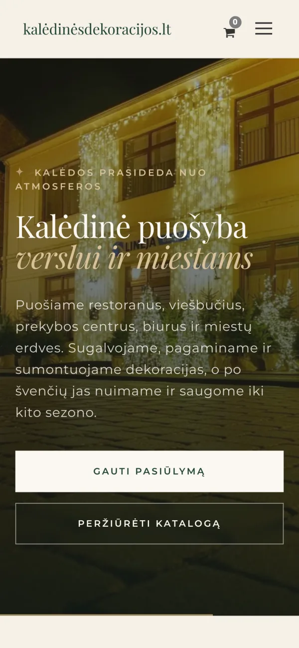Kalėdinės dekoracijos website on a phone
